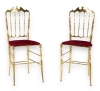 MOD 2118 Paire de chaises en métal doré à dossier ajouré imitant le bois tourné